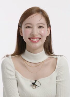 Beige Cut-Out Mock Neck Top | Nayeon - Twice